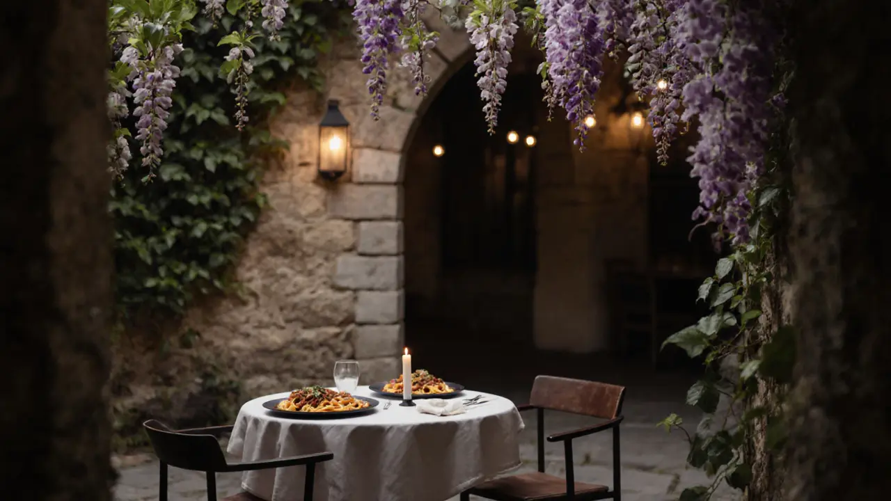 A candlelit courtyard dinner under wisteria vines in Milan, with elegant food on a small table.