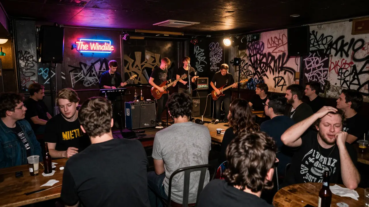 Band playing in crowded back room of The Windmill pub with no stage