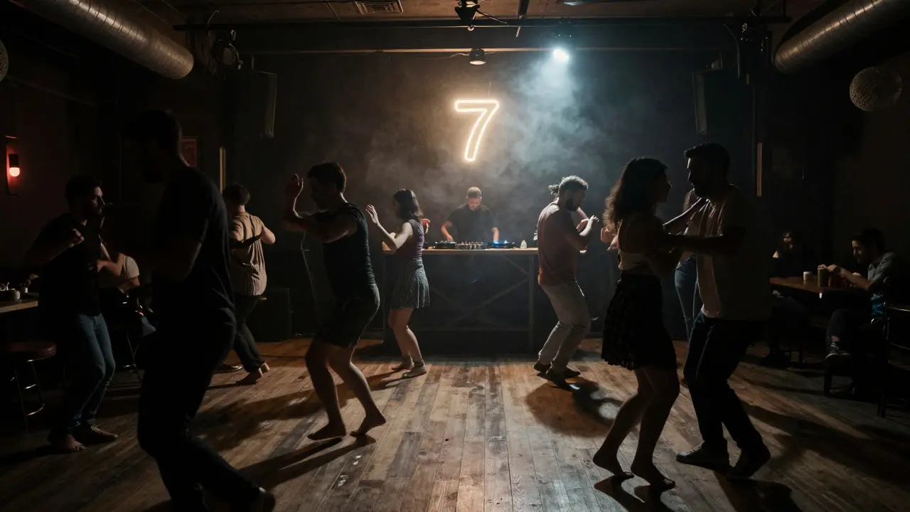 People dancing barefoot in a dim underground club in Kadıköy to Turkish-infused deep house music.